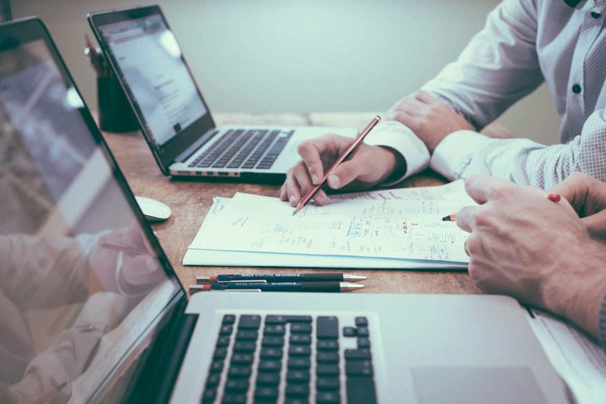 An accountant at a desk with a laptop