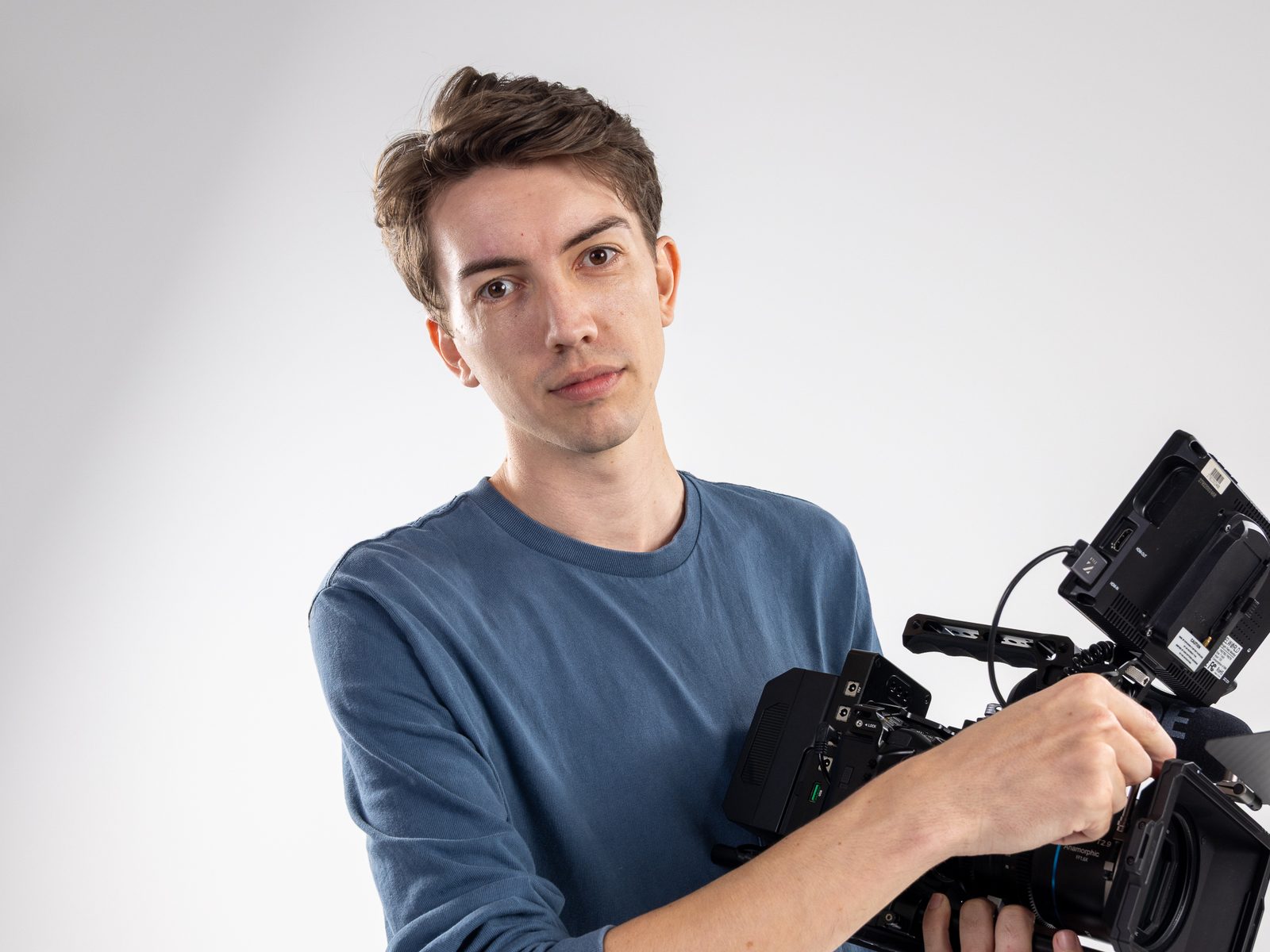 Lochie Burgdorf, co-founder of Stackt Marketing, with a cinema camera