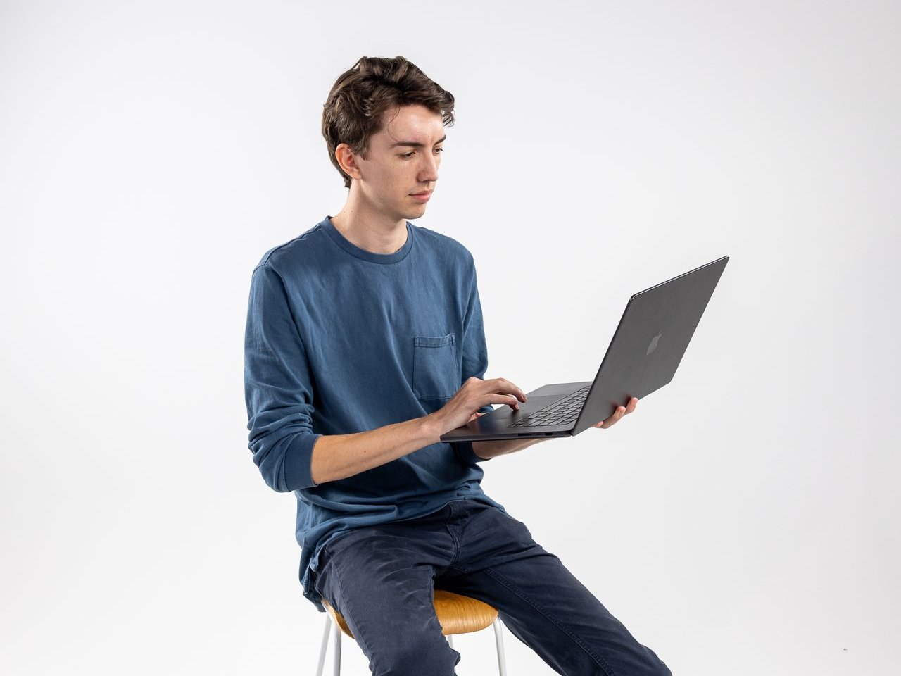 Lochie Burgdorf, Stackt co-founder, working on a laptop