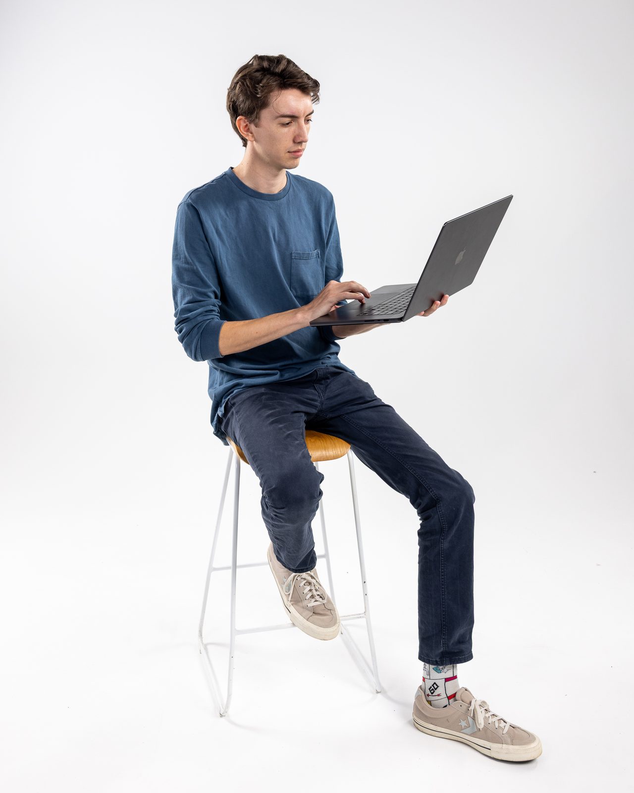 Lochie Burgdorf of Stackt Marketing working on a laptop