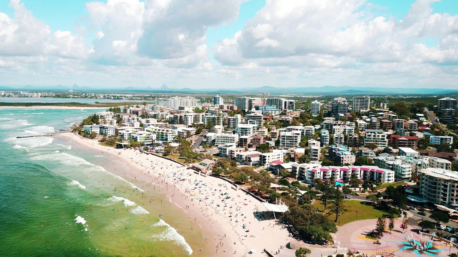 A Sunshine Coast beachfront and town from above